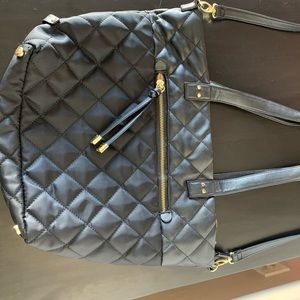 Black Utiliti tote. Easy to clean fabric, perfect for work or a night out